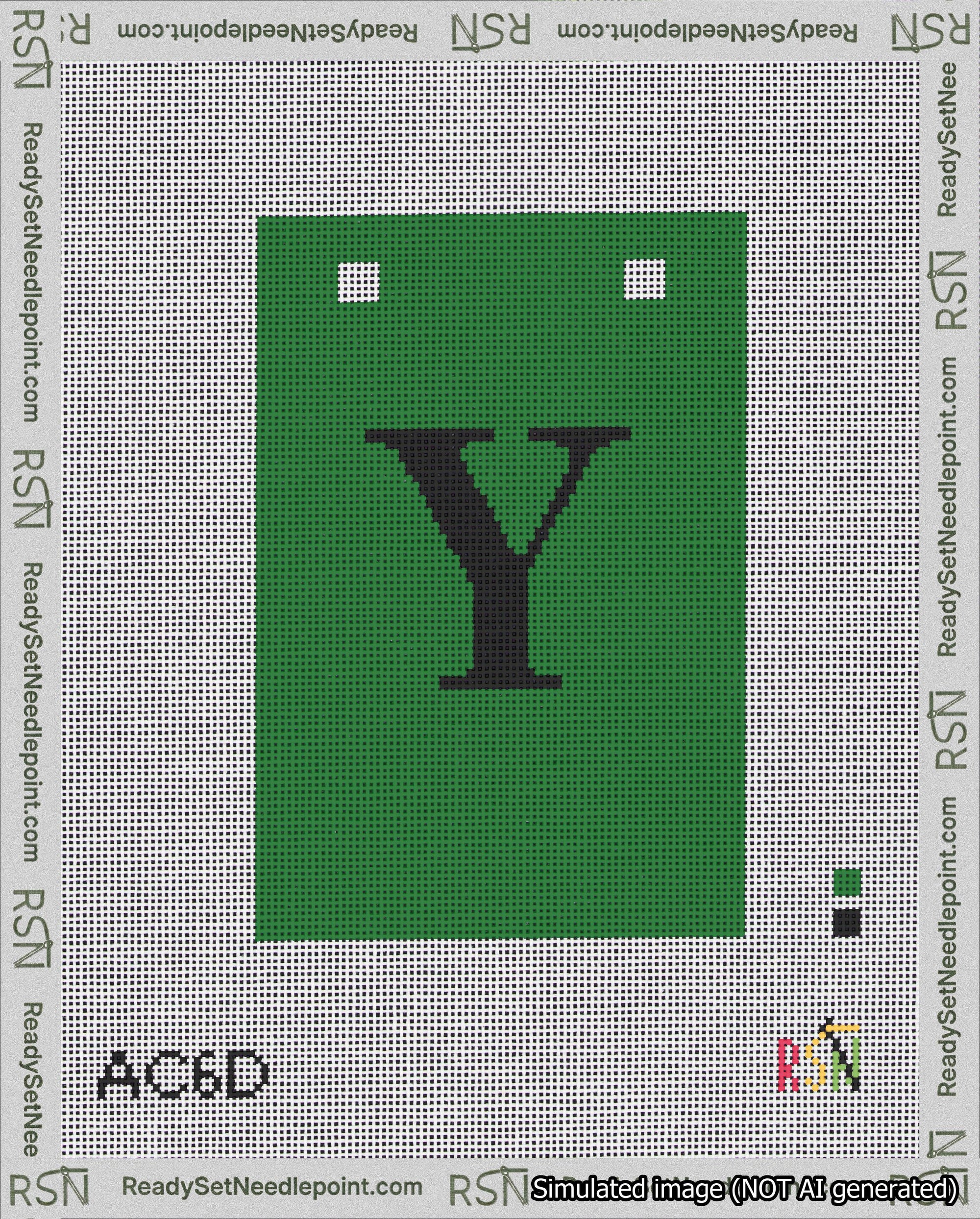 A taped needlepoint canvas with the design: Banner 18 mesh count Squared Y Black on Green.