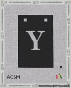 A taped needlepoint canvas with the design: Banner 18 mesh count Squared Y White on Black.