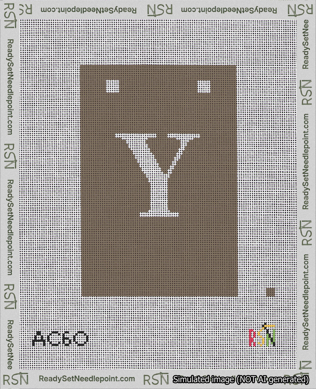 A taped needlepoint canvas with the design: Banner 18 mesh count Squared Y White on Brown.