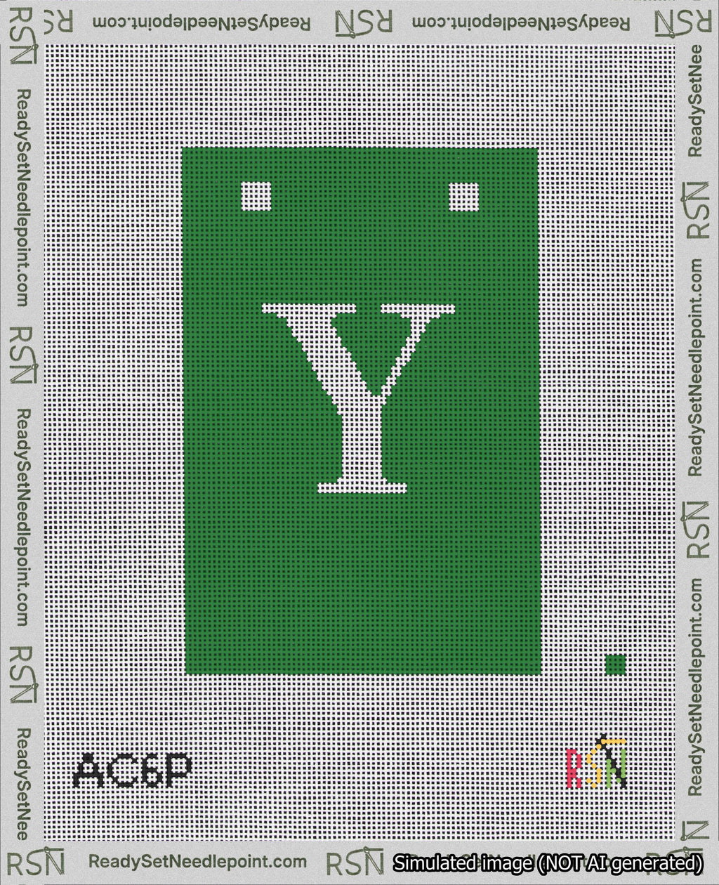 A taped needlepoint canvas with the design: Banner 18 mesh count Squared Y White on Green.