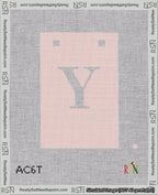 A taped needlepoint canvas with the design: Banner 18 mesh count Squared Y White on Pink.