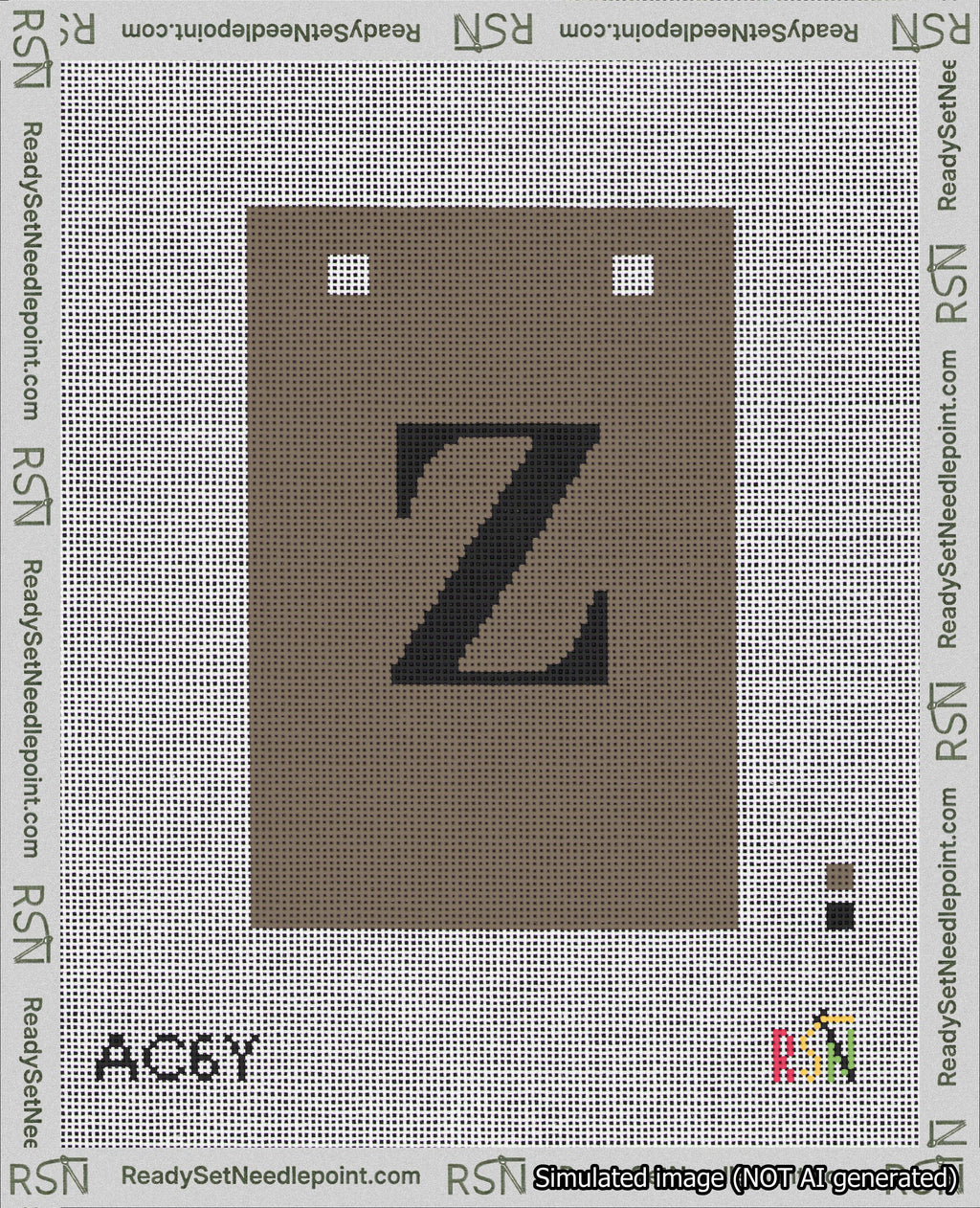 A taped needlepoint canvas with the design: Banner 18 mesh count Squared Z Black on Brown.
