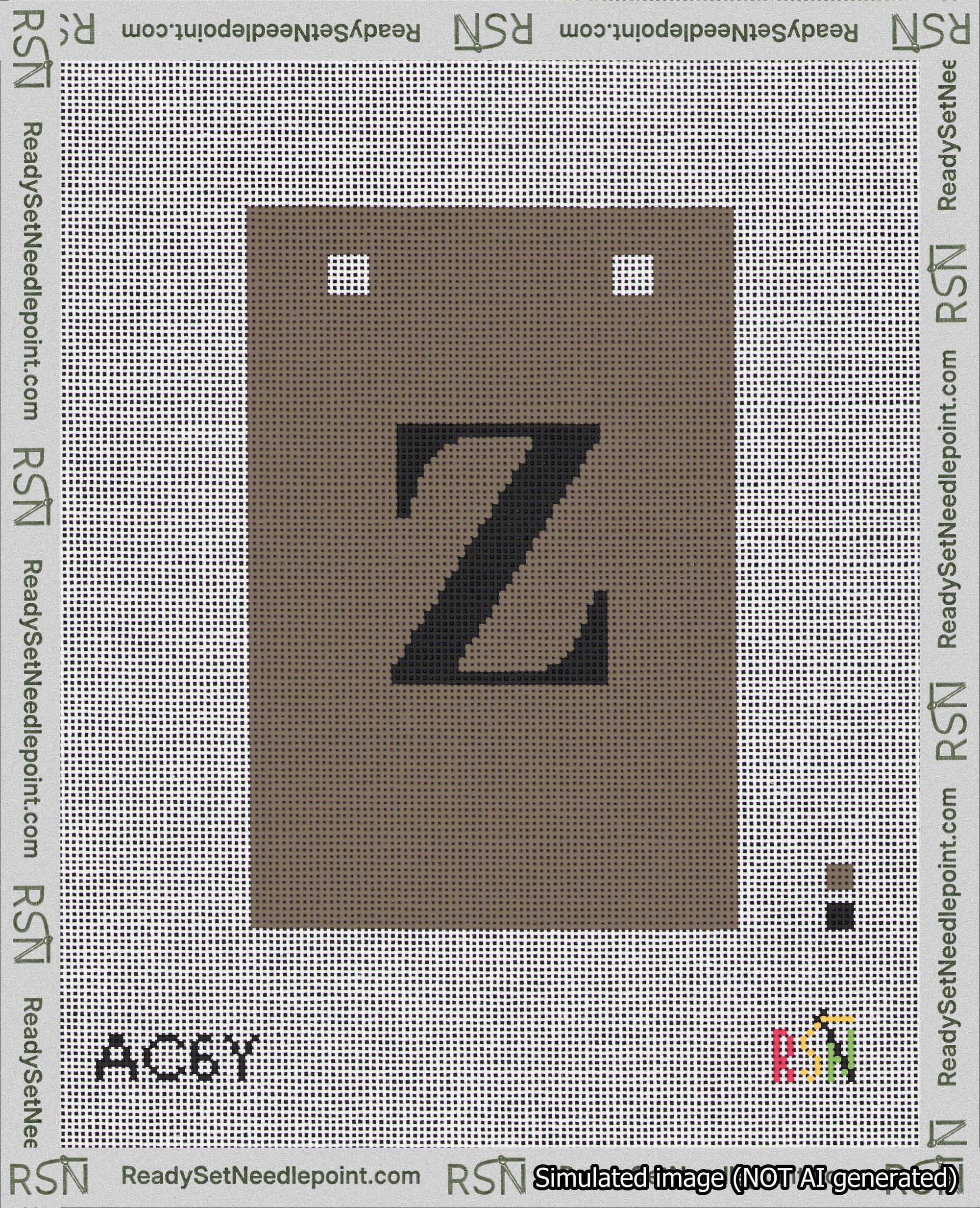 A taped needlepoint canvas with the design: Banner 18 mesh count Squared Z Black on Brown.
