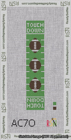 A taped needlepoint canvas with the design: Football Cuff.