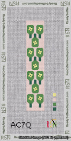 A taped needlepoint canvas with the design: Pickleball Green on Pink Cuff.