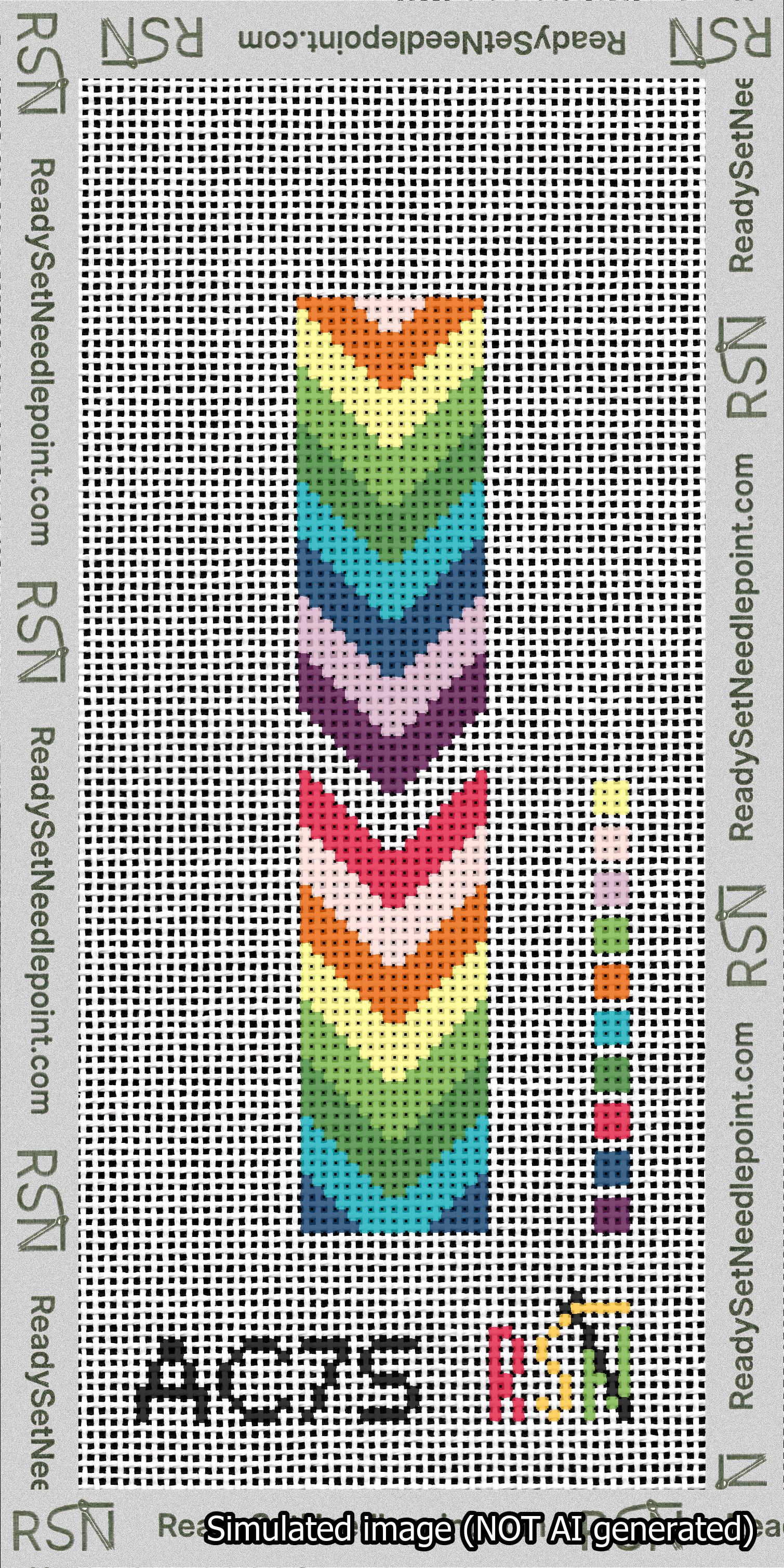 A taped needlepoint canvas with the design: Rainbow Chevrons Cuff.
