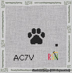 A taped needlepoint canvas with the design: Square Cat Paw Print Black On White.