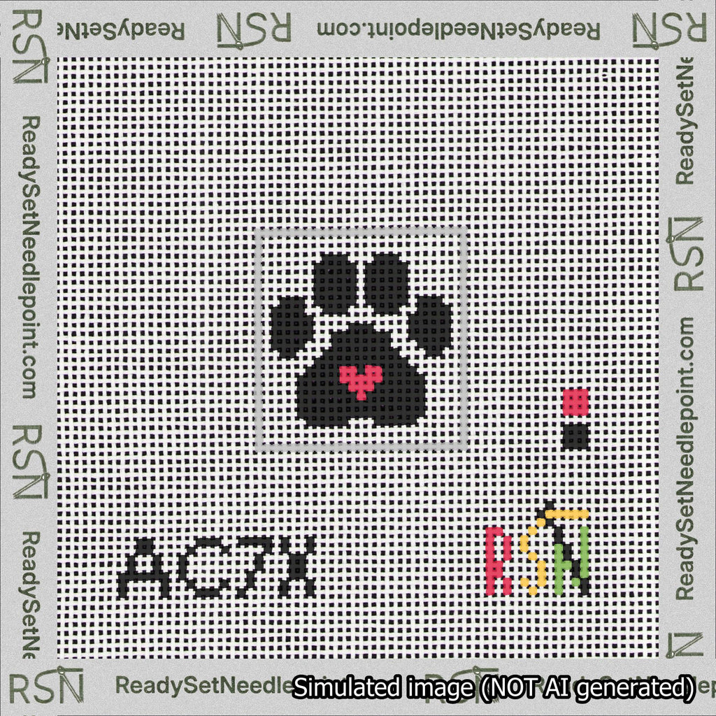 A taped needlepoint canvas with the design: Square Cat Paw Print Black On White with Red Heart.