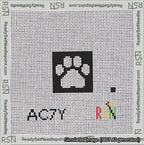 A taped needlepoint canvas with the design: Square Cat Paw Print White On Black.