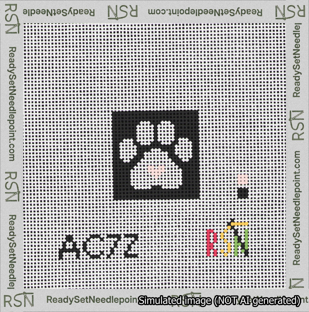A taped needlepoint canvas with the design: Square Cat Paw Print White On Black with Pink Heart.