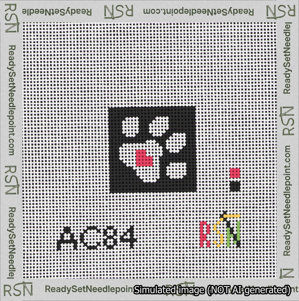 A taped needlepoint canvas with the design: Square Dog Paw Print White on Black with Red Heart.