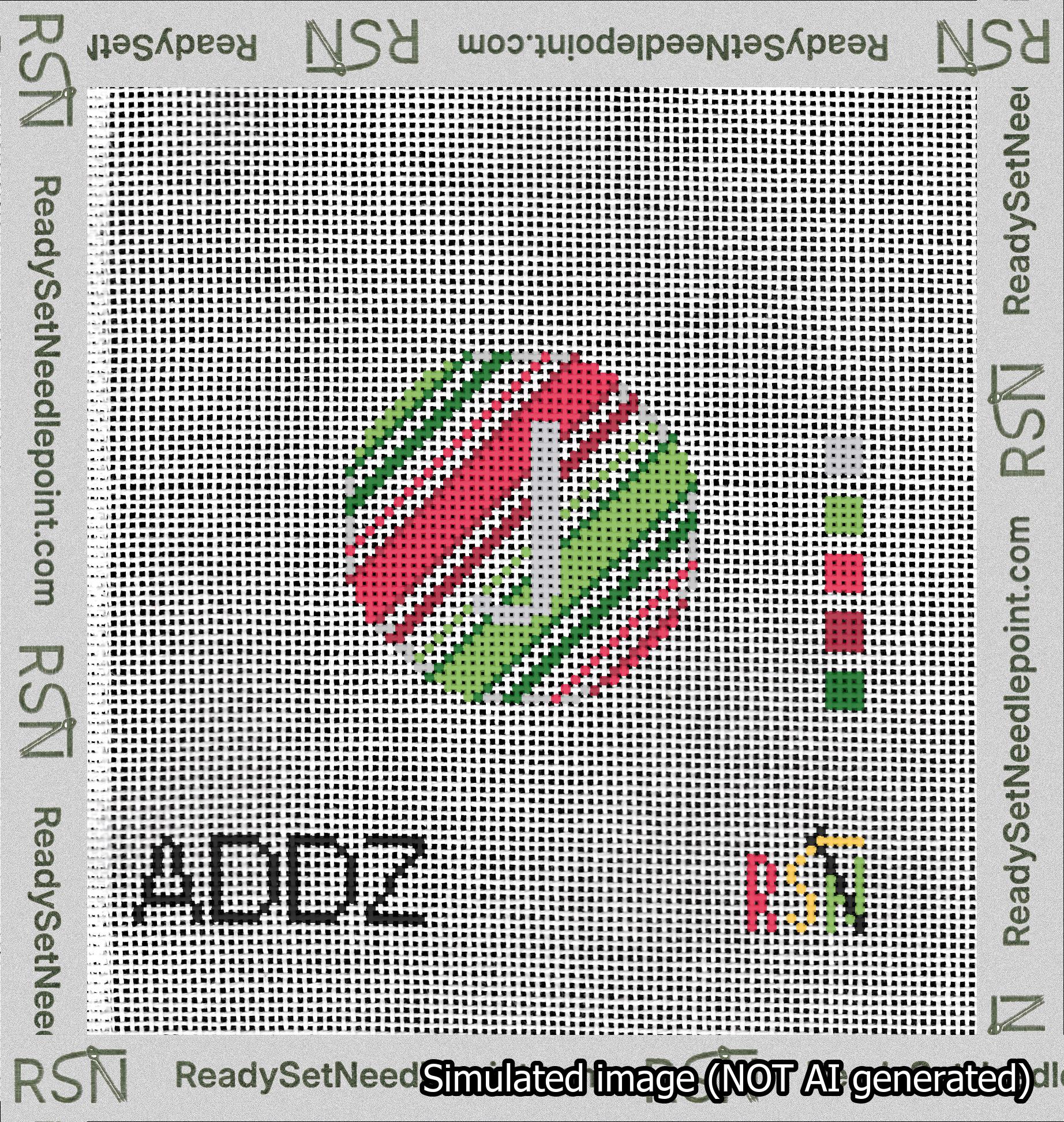 A taped needlepoint canvas with the design: Holiday Circle Initial J Font Silver Sans Serif Background Christmas Stripe.