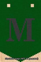 A simulated image of the stitched needlepoint design: Banner 13m Pointed M Black on Green. Not A.I. generated.
