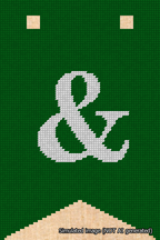 A simulated image of the stitched needlepoint design: Banner 18m Forked Ampersand White on Green. Not A.I. generated.