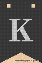 A simulated image of the stitched needlepoint design: Banner 18m Forked K White on Black. Not A.I. generated.